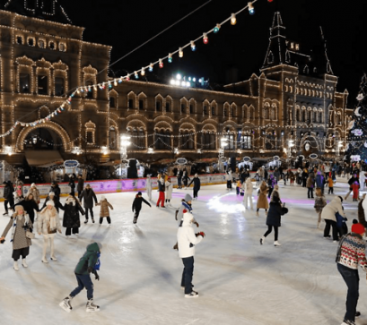 People skate on GUM ice rink at Red Square in Moscow